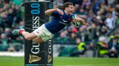 Damian Penaud dives over to score a try